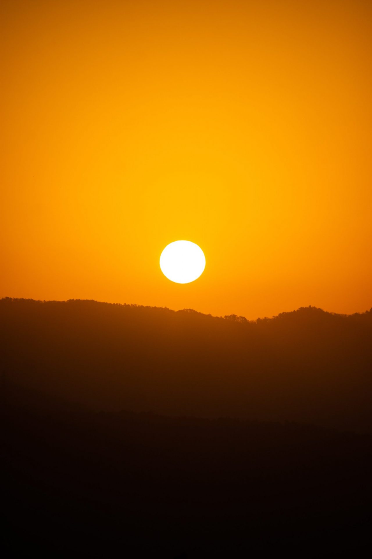 Rising sun over the mountains minimalist photograph