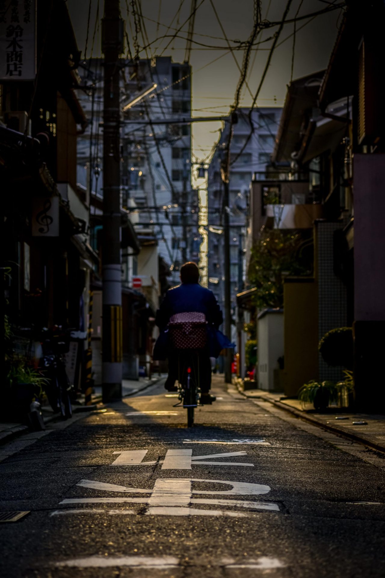 Biking home after a long day in Kyoto street photography