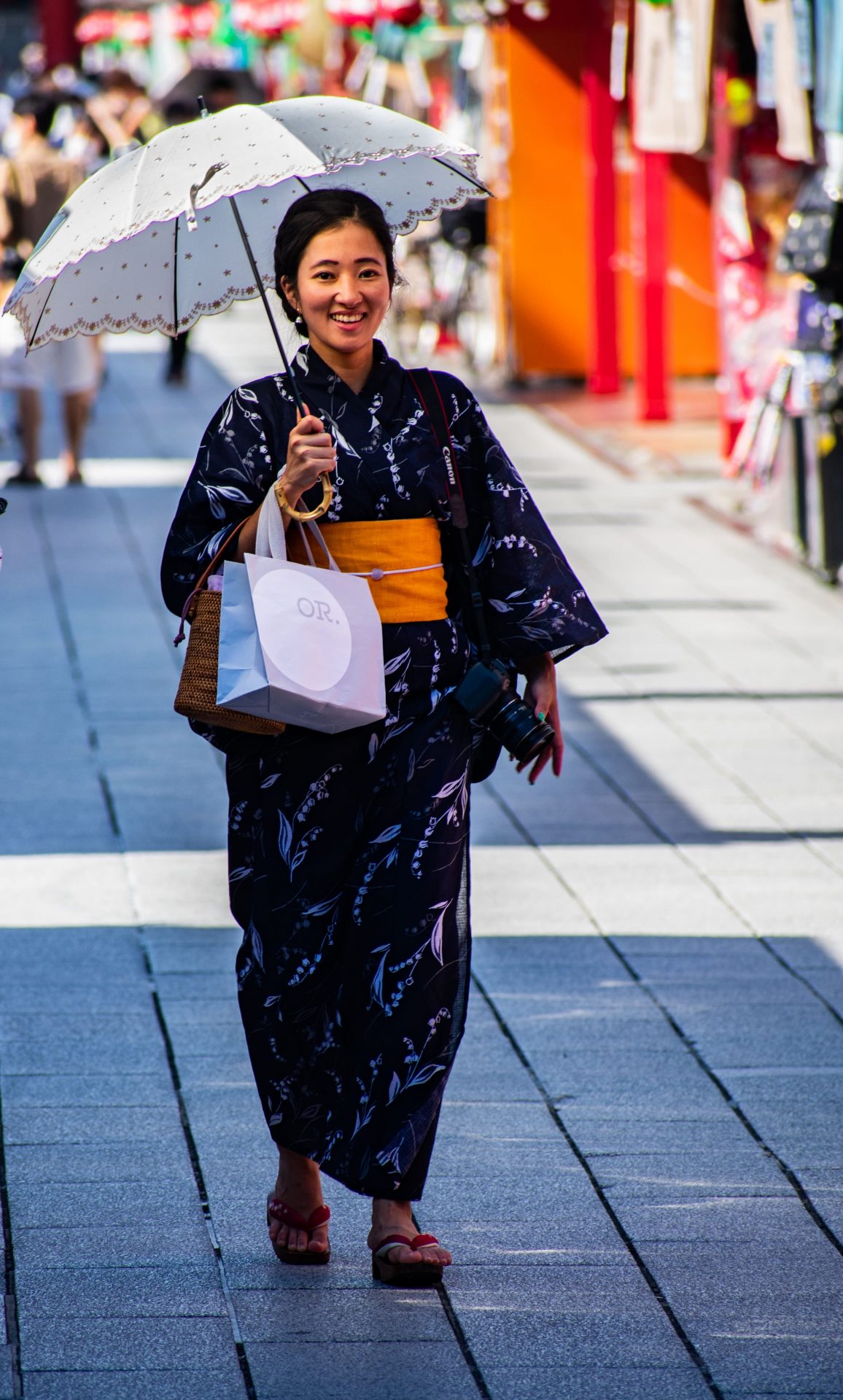 A lady wearing kimono made a pose for me while photographing